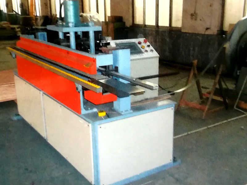 SF-K數(shù)控全自動(dòng)打扣機(jī)